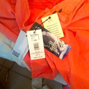 Two different brands one Adidas white and guyvHarvey sportswear